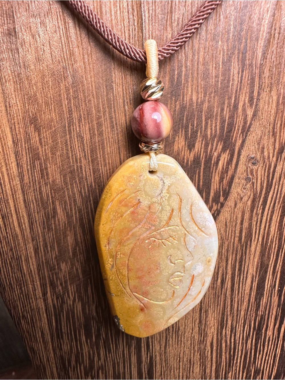 Coral Fossil Lady Profile Pendant Necklace on Brown Rope - Picture 10 of 14